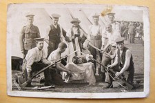 WW1 REAL PHOTO DURHAM LIGHT INFANTRY SOLDIERS ACTING AT CAMP 1914 POSTCARD