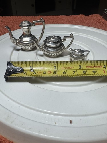 Three miniature tea - three,