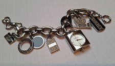 DKNY Women's Charm Bracelet With 7 Charms Inc Working Watch