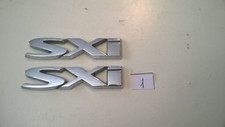 Genuine Vauxhall SXI Sides Badges letters (Corsa D, Astra H, Vectra C, Zafira B)