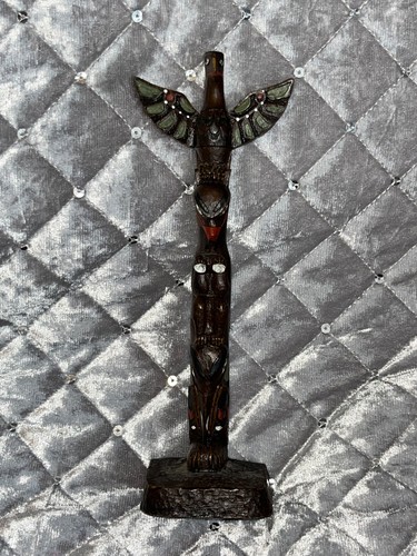 Traditional totem pole hand - pole,