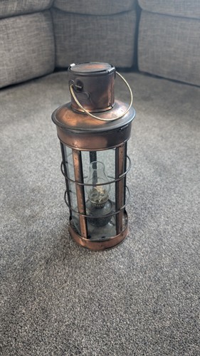 Copper caged oil lantern - caged,