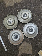 Set of Four Daimler sovereign Series 1 (XJ6) Hub Caps and centre badges