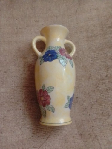 Small yellow vase with red - yellow, and