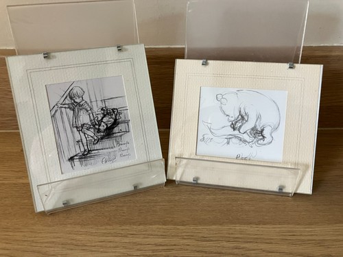 Two small framed winnie - two, the