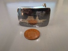 Tested as silver and 'Siam Sterling' stamped Nielloware buckle