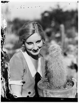 Woman next cactus - a, the