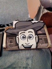 Loungefly Disney Pixar Toy Story Puppet Woody Flap Wallet