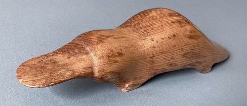 Carved wooden duck billed - duck,