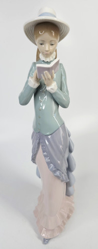 Lladro girl reading - a, book"