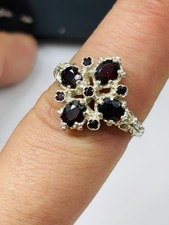 Old fully hallmarked silver ring UK size P with high quality garnets