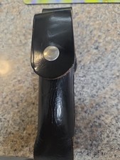 Baton Holder, Pull The Dot