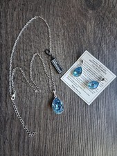 Silver And Blue Necklace And