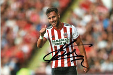 SHEFFIELD UNITED & GREECE: GEORGE BALDOCK SIGNED 6x4 ACTION PHOTO+COA