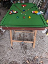 Pot Black kids pool/snooker table approx 6ft x 3ft. Cues and complete set balls