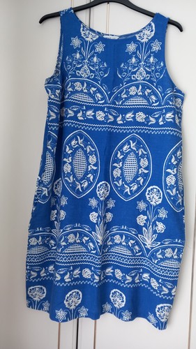Next patterned blue - next, &