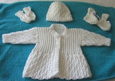 Hand knitted patterned matinee