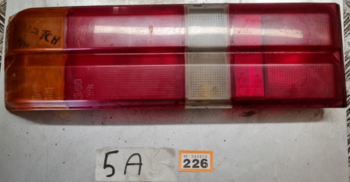 Mazda 323 passenger side rear - side,