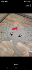 Hand crocheted elephant - hand,