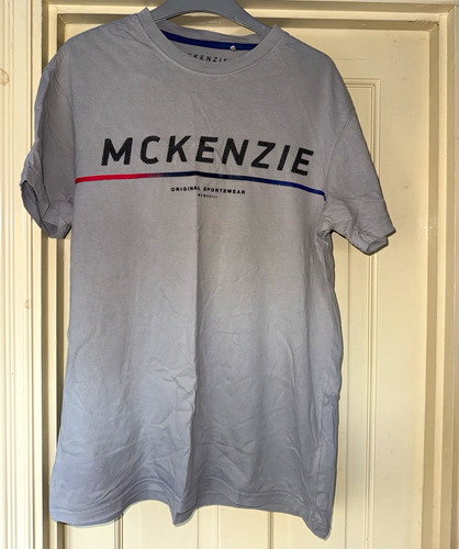 Mckenzie grey logo graphic - mckenzie,