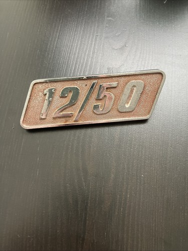 Triumph herald badge - triumph, 12/50