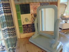 VINTAGE PAINTED MIRROR ON A