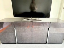 4 Door sideboard/ TV unit, finished with high-gloss dark grey koto wood veneers.