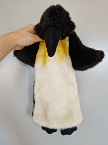 Penguin animal hand full - penguin,
