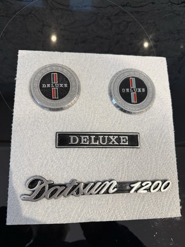 Datsun 1200 badges - 1200,
