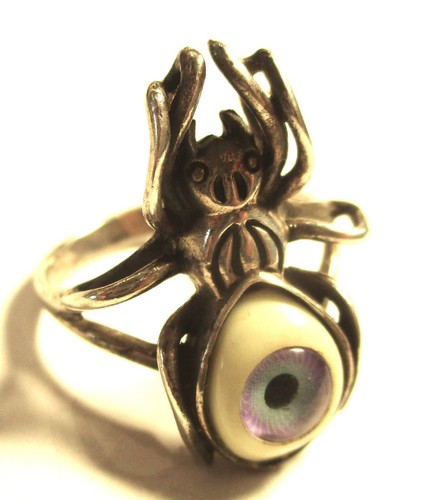 Silver prosthetic eye - evil,