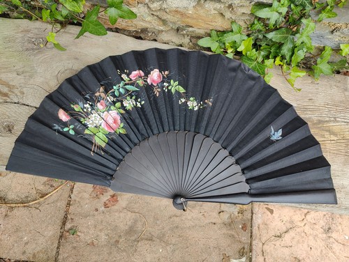 Antique fan with - with, roses