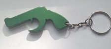 Vintage Metal keyring Green Toy Gun Bottle Cap Remover Opener 