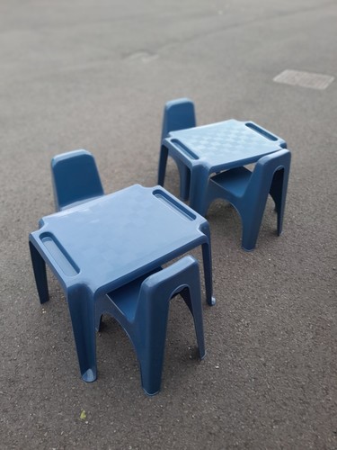 Two children play tables - two, and