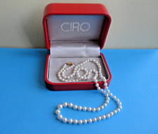 VINTAGE CIRO STRING OF SIMULATED PEARLS 51 CM LONG WITH A 9CT GOLD CLASP AND BOX