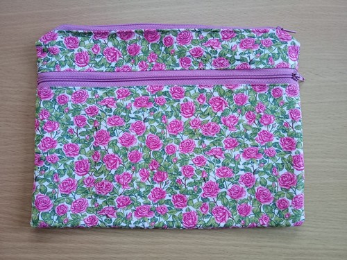 Small double zipped pocket