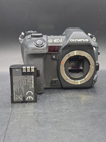 Olympus black digital slr - olympus,