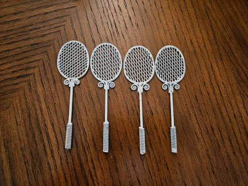 Ornate metal tennis - metal,