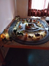 Hornby 00 gauge train layout fully illuminated 4 locos 3 carriages