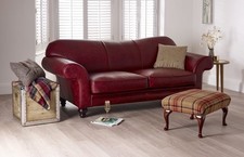 The Chesterfield Company Curved Back 2 Seater Antique Red Leather Settee.