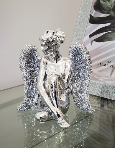 Sitting angel with - sitting,