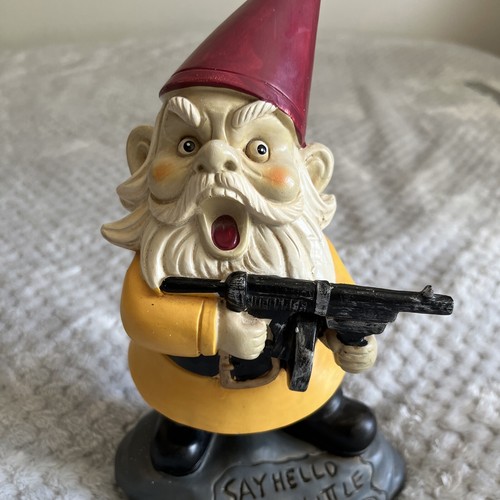 Garden gnome with - with, gun