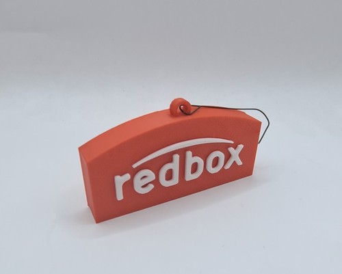 Redbox logo sign - logo, shelf