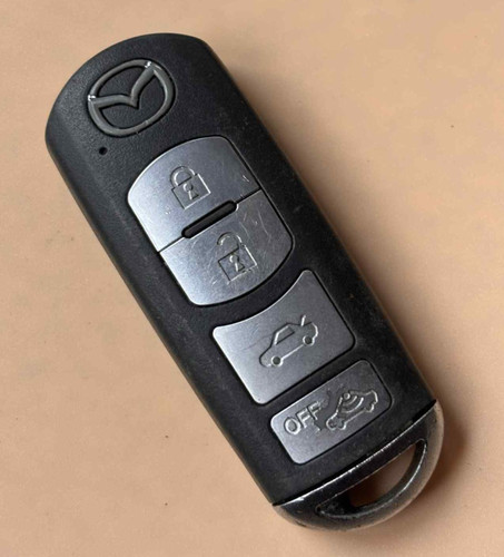 Genuine mazda button remote - mazda,