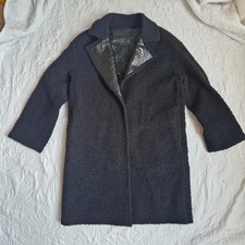 Black boucle coat with gloss