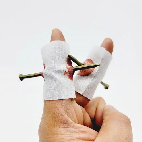 Nail through finger prank toy - finger,