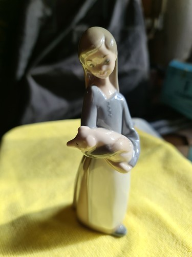 Lladro girl with piglet - with,