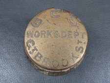 Antique brass B.C.S Works Dept