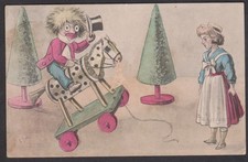VINTAGE POSTCARD 'A JOLLY CHRISTMAS' GOLLY ON TOY WHEELED HORSE,YOUNG GIRL,TREE