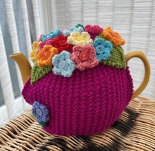 Hand Knitted Magenta Colour Tea Cosy With Flowers. Fits Medium Size Teapot
