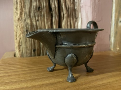 Antique pewter pouring jug - pouring,